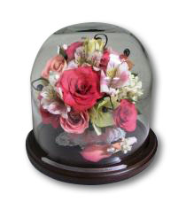 floral cake top preserved in table dome